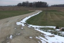 Tiny bit of snow north slope of driveway Nov. 23.jpg